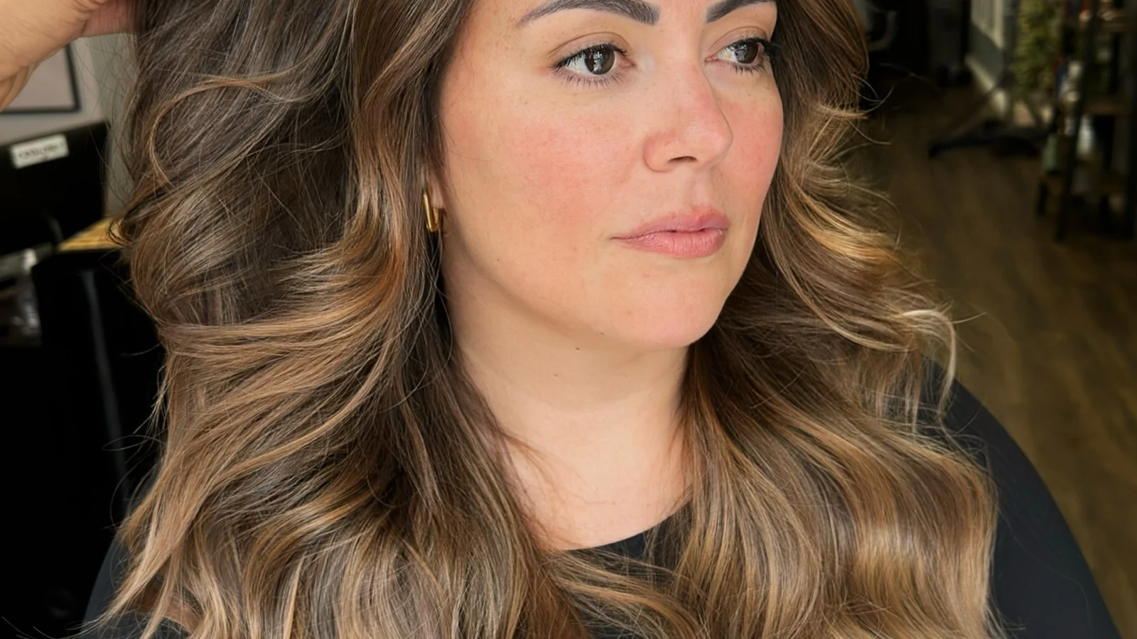 Client with smooth, glossy blow-dried hair after a Brazilian keratin treatment on Capel Street, Dublin 1